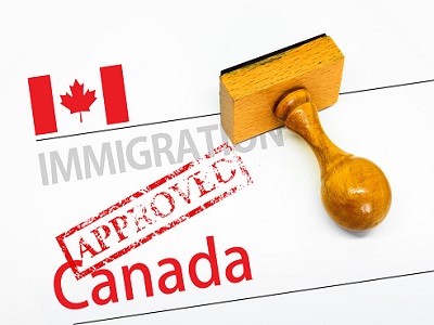 Approved Immigration Canada application form with rubber stamp